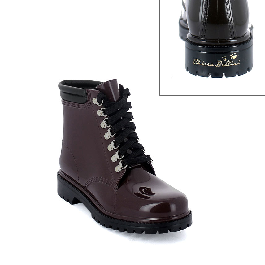 Short laced up walking boot in Sanguinaccio pvc with leatherette padded trim. New 3D logo.