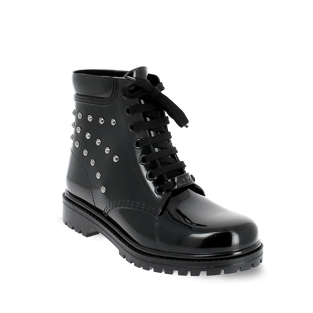 Short laced up boot in PVC with studs